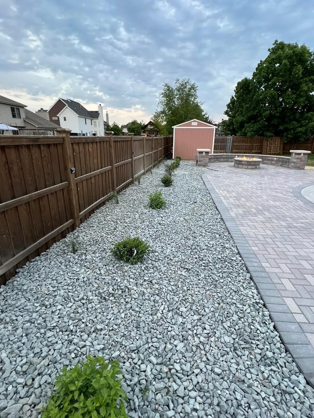 Landscape stone accents around entry beds in Morris, IL